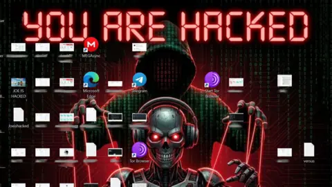 BBC reporter's laptop wallpaper reads "you are hacked" with an image of a robot skull